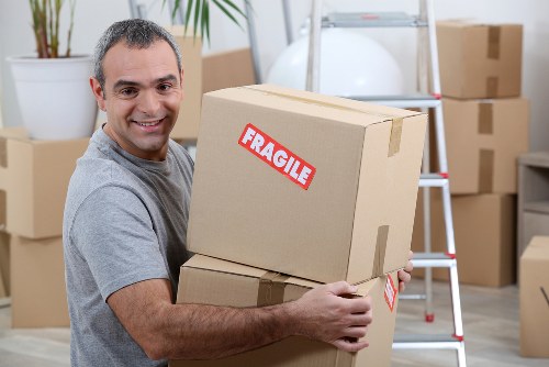 Professional furniture pick-up team in action