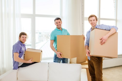 Man and Van team loading furniture into a van