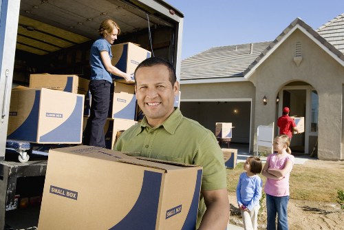 Professional movers assisting with packing in Mortlake